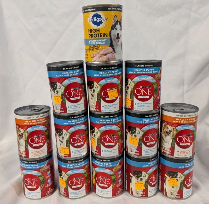 14 New Cans of Dog Food. 11 Cans of Purina One Puppy, 2 Cans of Purina One Wealth Weight Dog, and 1 Pedigree High Protein. Purina 368g, Pedigree 375.