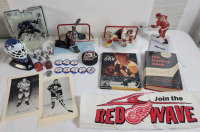 NHL Hockey Memorabilia Lot . 2 Beehive Cards , 4 Player Figures , 2 Books , Sabres Puck , 8 Caps , Avalanche Ring , Mini Figs holding Cup , Wings Towel , Avalanche Goalie Helmet