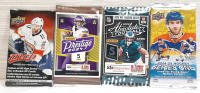 Lot of Sports Trading Cards Packs, Including Upper Deck 2022-23 NHL Hockey MVP 6 Card Pack, Panini 2024 NFL Football Prestige 5 Card Pack, Panini 2024 NFL Football Absolute Football 5 Pack & Upper Deck 2024-25 NHL Hockey Series One 4 Card Pack