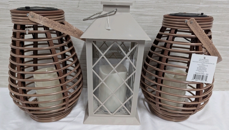 3 New Solar Powered LED Candle Lanterns. Tallest Measures 11" Tall.