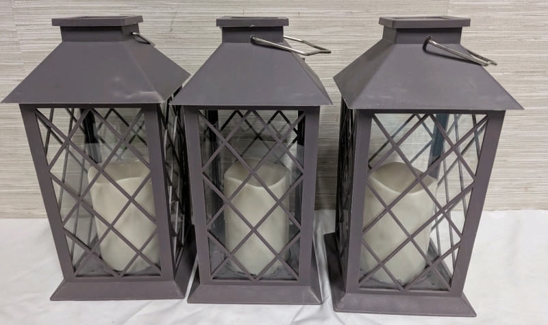 3 New LED Powered Candle Lanterns. Tallest is 11" Tall