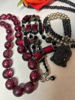 Carved Buddha / Raspberry Glass / Brick and Capped Bead Necklace