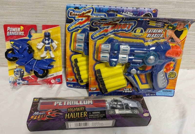 New Assorted Toys Lot. 1 Power Rangers Figure, 1 Might Fleet Highway Hauler and 2 Cyber Shot Extreme Blasters.