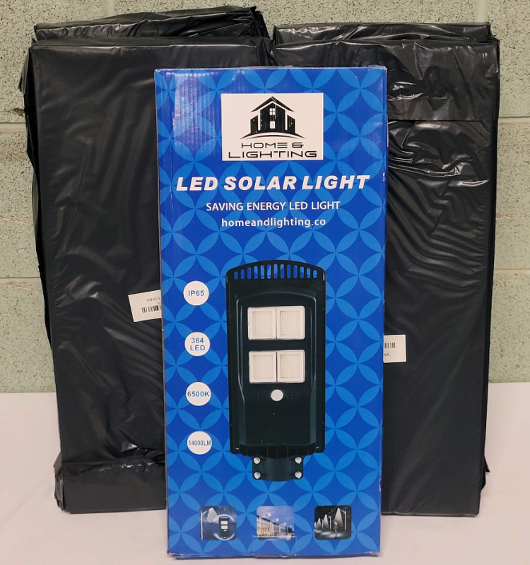 5 New Home & Lighting Outdoor LED Solar Lights w/Remotes . Motion Sensor Brightness , 14000LM (140watts) , 6500k , Shine Angle 180&deg; . Each Light measures 19 3/4"&times;8 3/4"