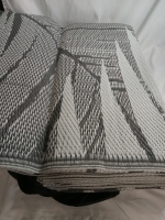 New | Outdoor Straw Like Rug | Estimated to Be 9ft x 11ft 8"
