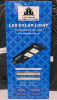 5 New Home & Lighting Outdoor LED Solar Lights w/Remotes . Motion Sensor Brightness , 14000LM (100watts) , 6500k , Shine Angle 180&deg; . Each Light measures 19 3/4"&times;8 3/4" - 3