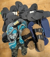 15+ Pairs of Assorted Men's Sandals, Water Shoes, & Flips Flops. Assorted Styles & Sizes.