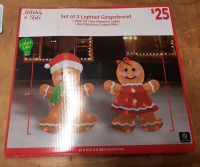 New Set of 2 Lighted Gingerbread Figures for The Holidays (23" Tall and 21" Tall)
