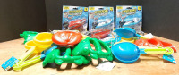 Lot of Children's Toys, Including 6 Wind Up Speed Boat Toys & 10 Beach Sand Tools