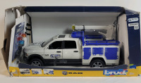 New - Bruder RAM 2500 Service Truck with Rotating Beacon Light (working) . Original Box Has Tear Damage. Never Removed from Box . 1:16 Scale (15" long)