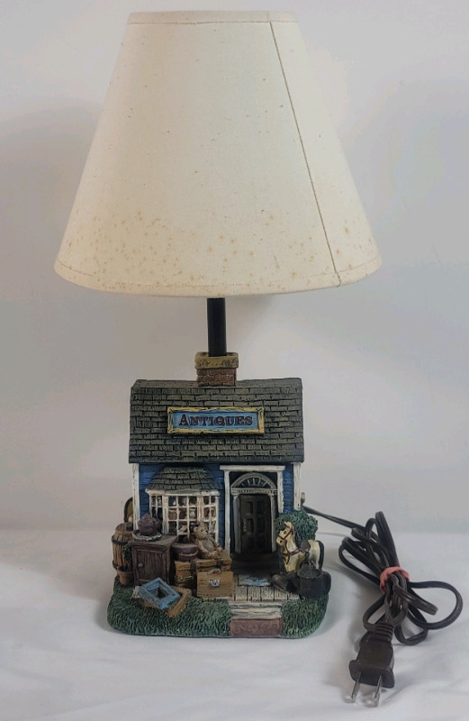 Home Decor Resin " Antique Store " Table Lamp . Measures 15" Tall . Tested Working , Includes Bulb