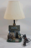 Home Decor Resin " Antique Store " Table Lamp . Measures 15" Tall . Tested Working , Includes Bulb