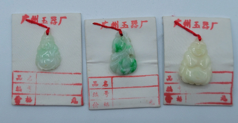 Three (3) Hand Carved Jade Buddha Mini Pendants .