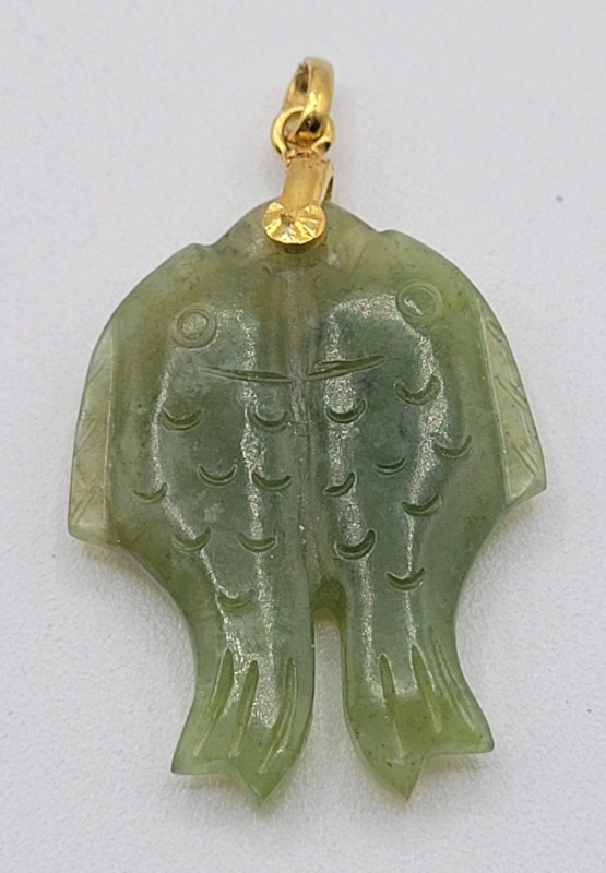 Vintage Hand Carved Jade Fish Pendant .