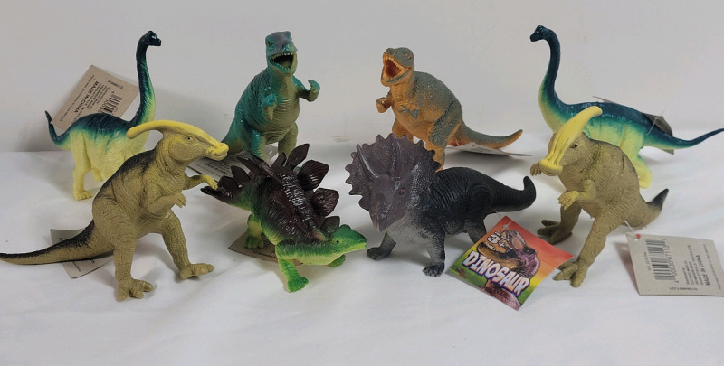 8 New Dinosaur Plastic Figures . Measures 3.5"&times;6"