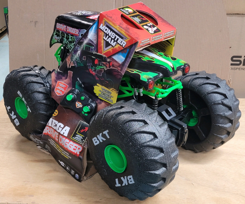 New - Monster Jam Mega GRAVE DIGGER All-Terrain Remote Control Monster Truck, Over 2 Ft. Tall, 1:6 Scale . Box has some tear damage , does not effect product