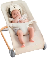 New Fodoss Portable Bouncer Seat for Babies. 28"D x 17.7"W x 20"H. Retails for $63 US