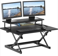 New: SHW 36-Inch Over Desk Height Adjustable Standing Desk With Monitor Riser - Turn Normal Desk Into Standing Desk - See Photo For Dimensions - Retails for 166$