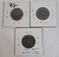 1905 - 2006 Canadian 25 Cent Quarters . 1905 Silver , 1973 & 2006 . Three (3) Coins
