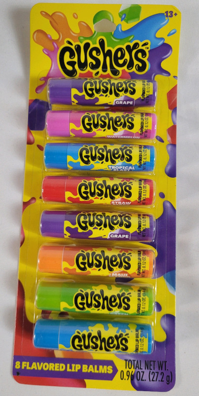 8 New GUSHERS Fruit Flavored Lip Balms . 8 Different Flavors