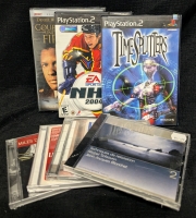 7 Media Disks - 4 CDs - 2 PS2 Games Timesplitters - NHL 2004 - 1 DVD Courage Under Fire