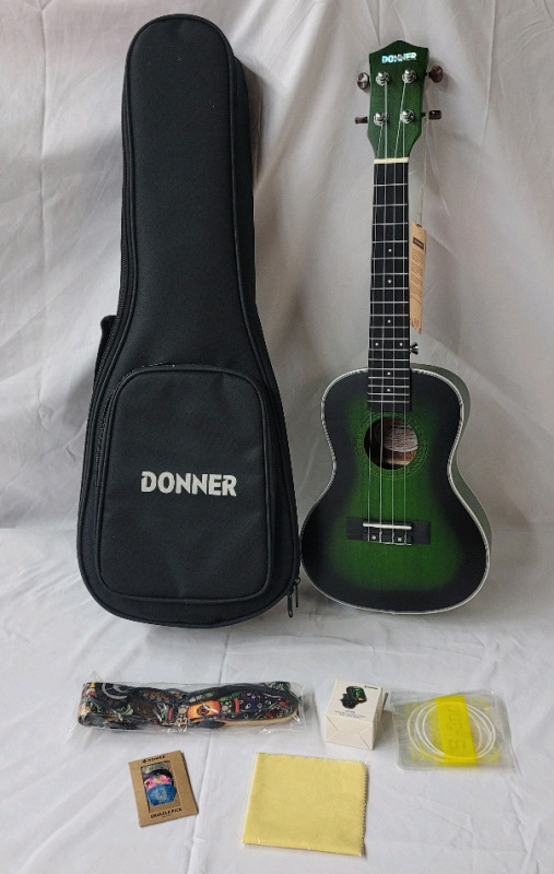 New - Donner 26" Concert Size Ukulele w/Travel Bag & Accessories . Model # DUC-200G . Retail $70