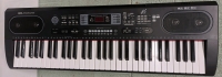 New 61 Key Electronic Keyboard. 37" by 12" by 37"