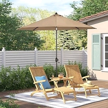 New Ulax furniture 9 Ft Outdoor Umbrella. Retails for $460!