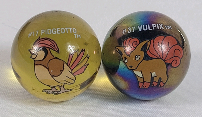Vintage 1998 Pok&eacute;mon Marbles . #17 Pidgeotto & #37 Vulpix .