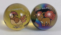 Vintage 1998 Pok&eacute;mon Marbles . #17 Pidgeotto & #37 Vulpix .