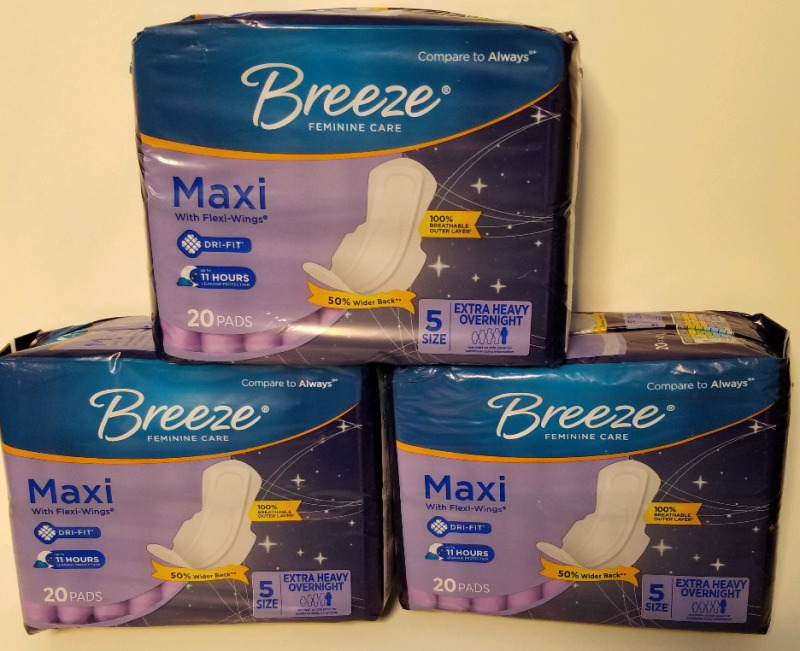 3 new sealed packs of Breeze feminine care pads