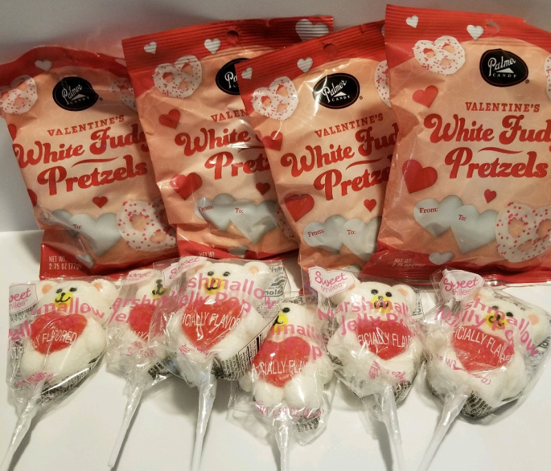 6 marshmallow jelly pops and 4 bags white fudge pretzels