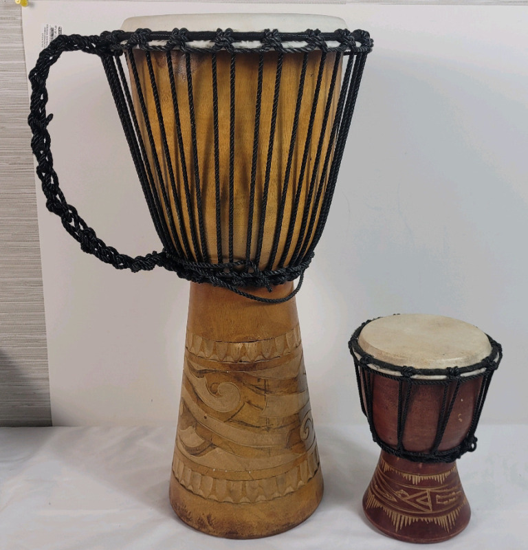 Indonesia Hand Crafted " Djembe " Drums . Measures 19.5" & 8" Tall
