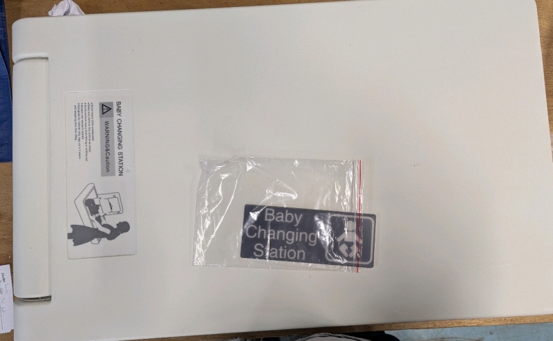 New Mountable Baby Changing Station. 19.5" by 32.5" by 4.5" When folded. All Parts Appear present.