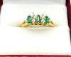 Round CZ (0.30ct) with Rectangular Green CZ (0.30ct) Ring, Size 8.75, W/A $345.00. - 2