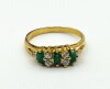 Round CZ (0.30ct) with Rectangular Green CZ (0.30ct) Ring, Size 8.75, W/A $345.00. - 4