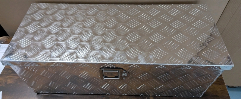 New Metal Locking Trunk. 30" by 13" by 10". Minor cosmetic Damage From Transit.