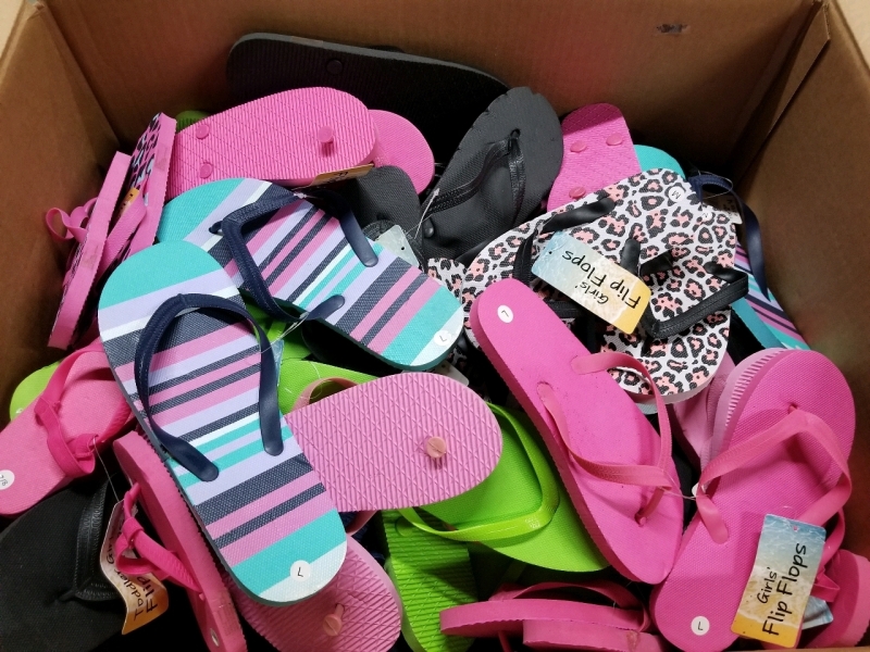 50 plus pairs of assorted flip flop sandals