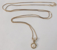 10K Gold Chain w/10K Pearl Pendant . Chain measures 24 1/4" long