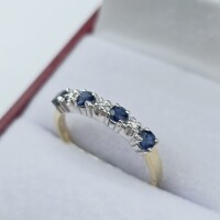 10KT Yellow and White Gold Natural Blue Sapphire (0.40ct) and Diamond (0.03ct) Ring, Size 6.5, W/A $1100.00. Sapphire is the birthstone for September.