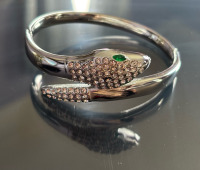 Green Eye Rhinestone Serpent Bracelet Titanium Steel Clear Rhinestones Approximately 2.35 diameter Opens 4.5 In