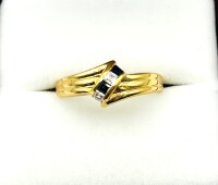 Natural Blue Sapphire (0.10ct) with CZ (0.16ct) Ring, Size 7.5, W/A $300.00. Sapphire is the birthstone for September.