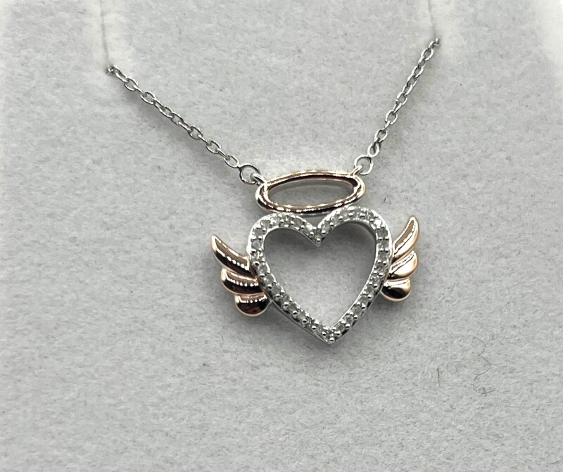 Sterling Silver Natural Diamond (0.11ct) Heart with angle wings Pendant and Sterling Silver Chain, W/A $700.00.