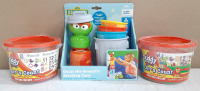 Lot of Children's Playsets, Including 2 Kiddy Dough "Let's Count" Modeling Play Sets (56g of Dough Each) & Sesame Street Oscar the Grouch's Stacking Cans
