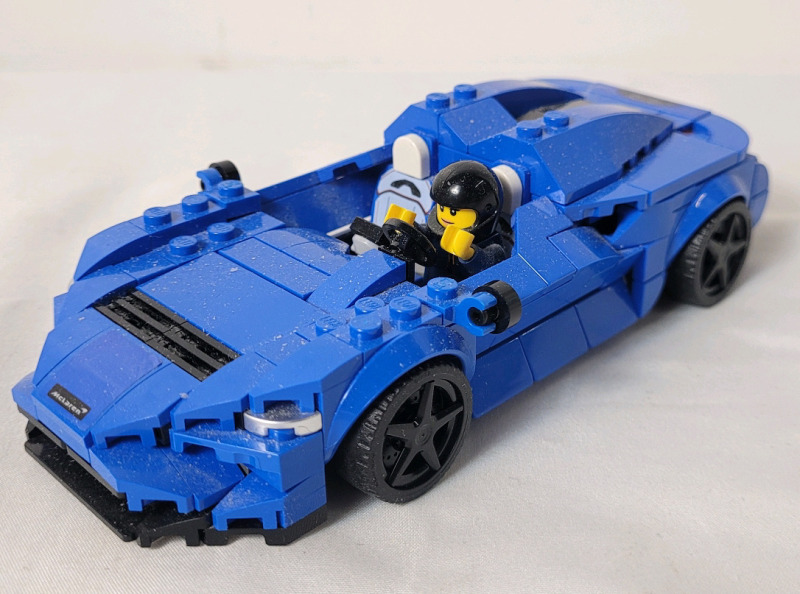 LEGO Speed Champions McLaren Elva Build Set , #76902 . 263pcs w/Mini Fig . Appears Complete, Missing 4 Extra Grey Rims . Dust from display