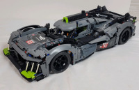 LEGO Technic PEUGEOT 9X8 24H Le Mans Hybrid Hypercar Build Set , # 42156 . Assembled , 1775 pcs. Appears Complete . Some dust from display . Measures 20"&times;9"