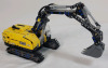 LEGO Technic Heavy-Duty Excavator Build Set , # 42121 . Assembled , 565 pcs. Appears Complete , Missing 4 red pylons . Some dust from display . Measures 12"&times;4.5" - 2