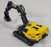 LEGO Technic Heavy-Duty Excavator Build Set , # 42121 . Assembled , 565 pcs. Appears Complete , Missing 4 red pylons . Some dust from display . Measures 12"&times;4.5" - 4