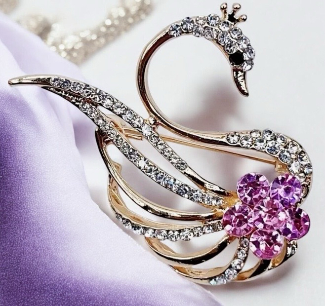 Elegant Swan Shaped Brooch Decorated with Shiny Rhinestones Shades of Purples and Clear Approximately 1.75 x 2 Inch