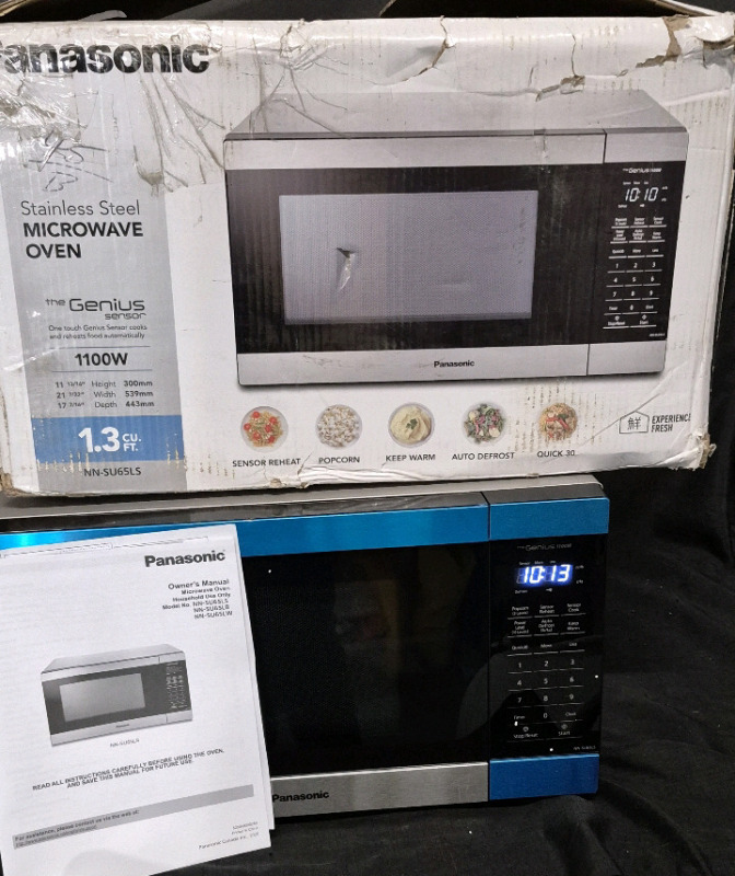 As New in Box Panasonic The Genius Stainless Steel Microwave Oven 1.3 cu.ft. Model NN-SU65LS - Couple Dents Present Retails for $169